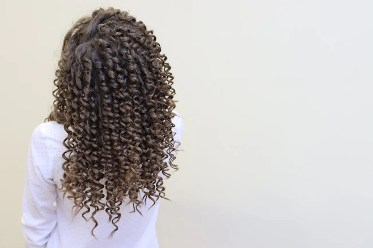 Oversized braid dressed close to the head